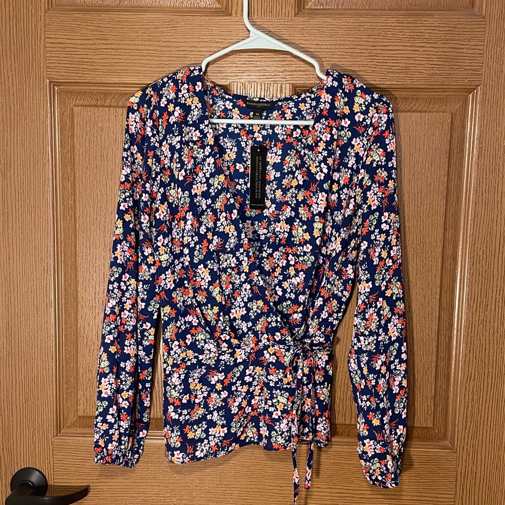 Peplum Wrap blouse size medium new with tags!